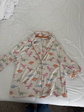 Cream Dinosaur Print Pajama Top and bottom with Orange Piping